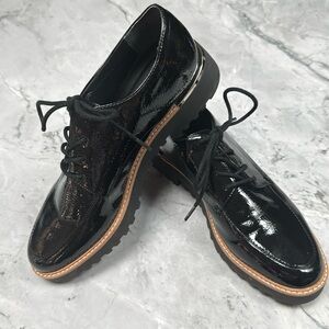 Franco Sarto, size 7 patent leather tie loafer.